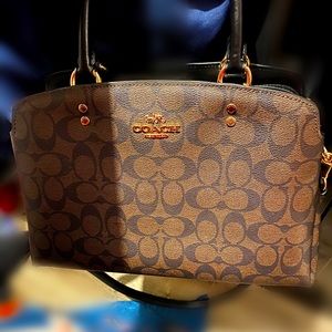 Brand new authentic Coach handbag..